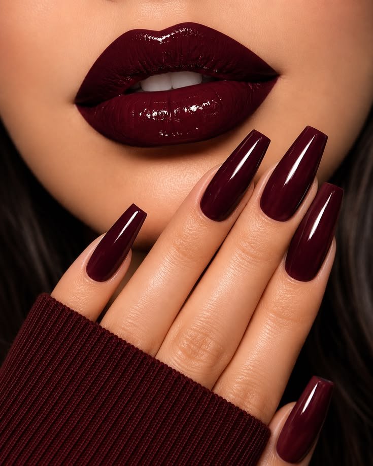 Cozy Fall Nail Designs with orange leaves